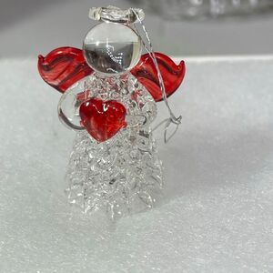 Vintage 2” hand blown spun glass Angel holding a heart ornament.